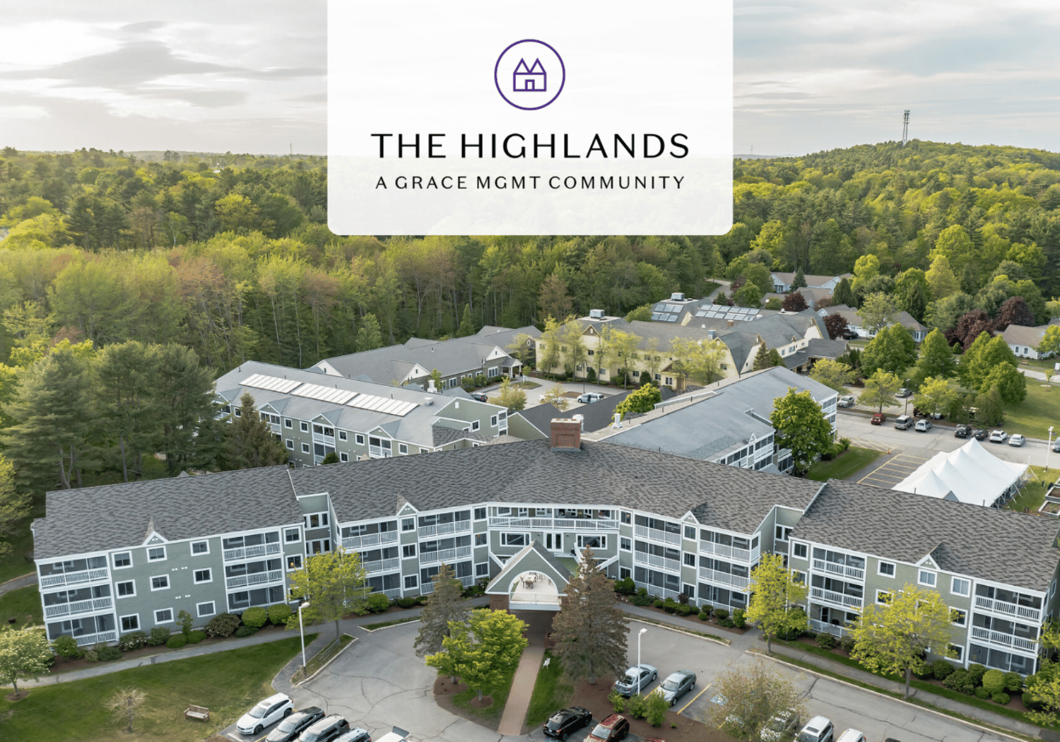 Aerial view of a multi-building residential complex with green trees, centered by a curved entrance, and a translucent overlay showing 'THE HIGHLANDS' logo.
