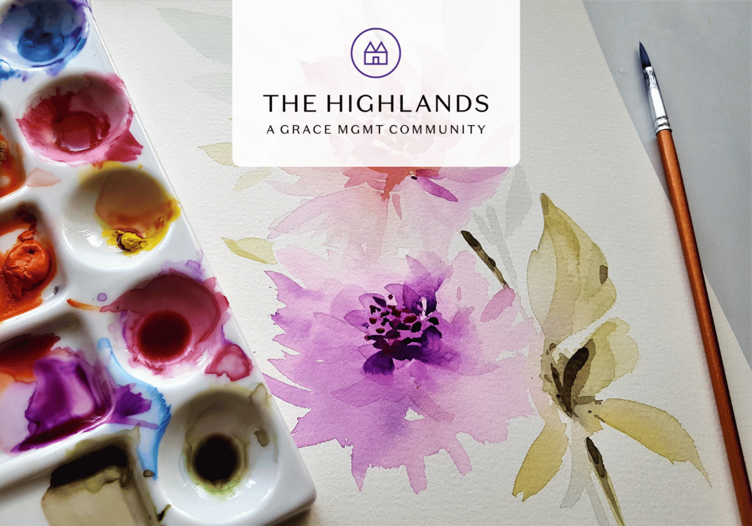 Watercolor painting setup with a colorful paint palette on the left, a pink-purple flower painting in the center, and a brush on the right; logo overlay at top.